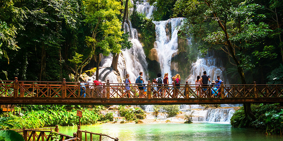 Kuang Si waterfall in Laos, Luang Prabang. Popular touristic destination during the sunny day in Laos