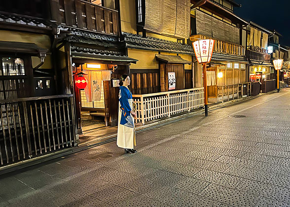 Girl in charming Gion street at night