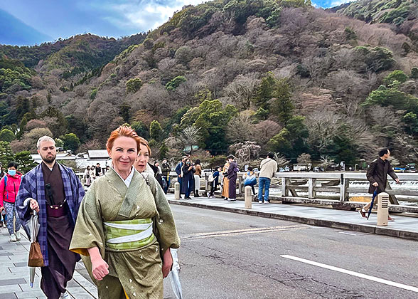 Tourists on Togetsu-kyo Bridge