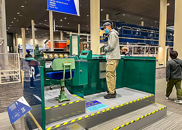 Boy interacting with rail equipment