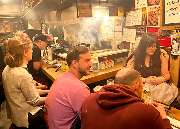 Our Guests Trying Local Food