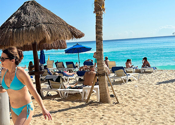 People Are Sunbathing on Beach Chairs