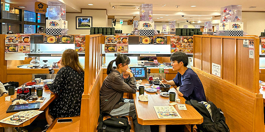 Sitting & Dining at a Japan Sushi Restaurant