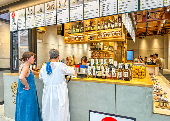 Customers are making order before a food store