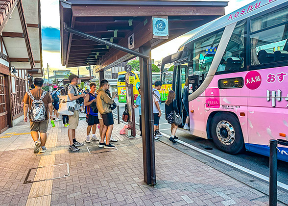 Queuing visitors before highway bus