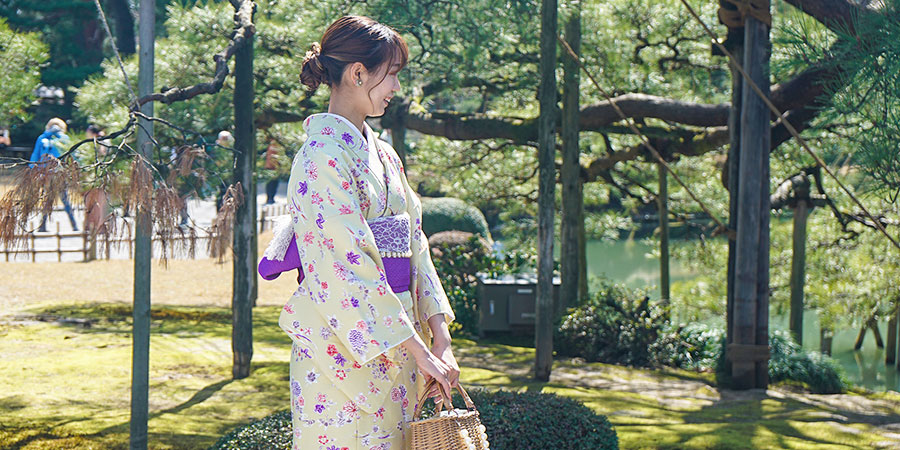 A Visitor Dressed in Traditional Japanese Clothes in Shukkei-en