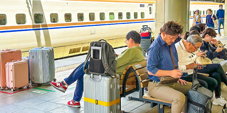 People Waiting for Trains at the Station, Japan