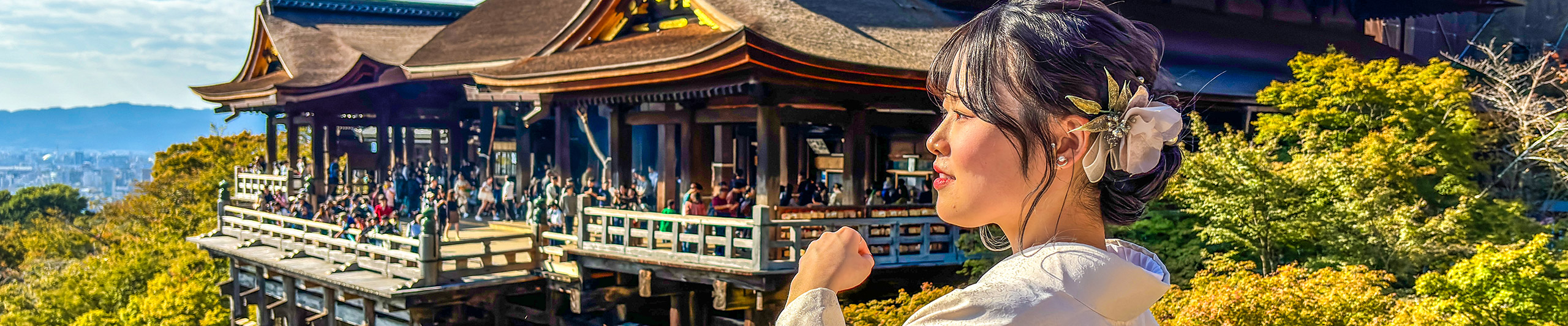 A girl in Kimono and Kiyomizu Stage on the opposite