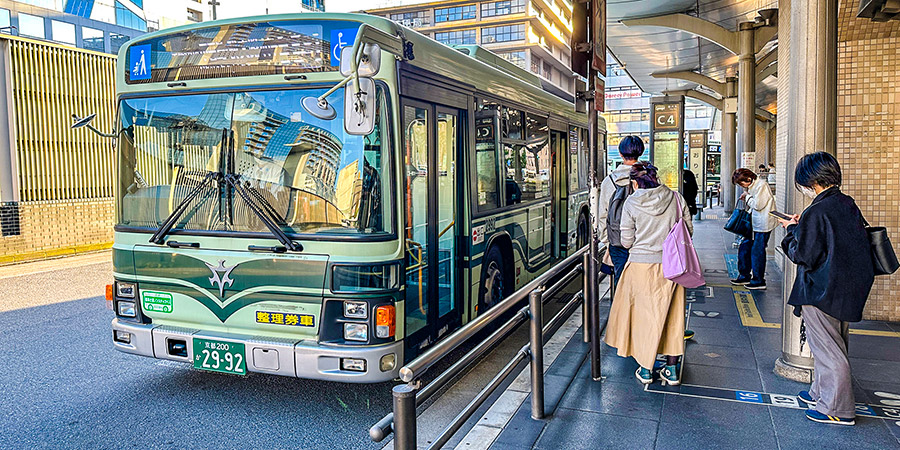 The waiting passengers near the bus stop