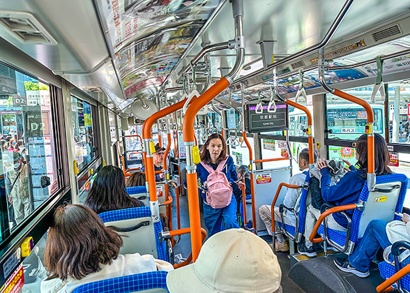 Passengers in the carriage of Kyoto City Bus 105