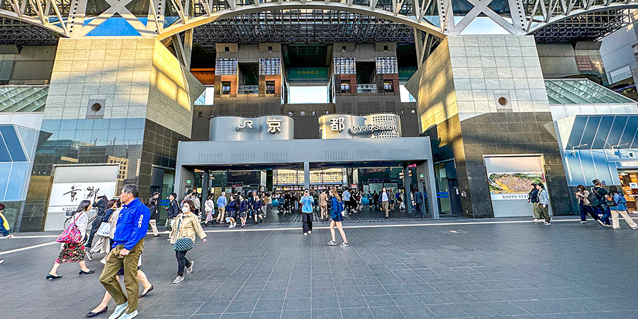 Kyoto Station on a clear day and passenger by the entrance