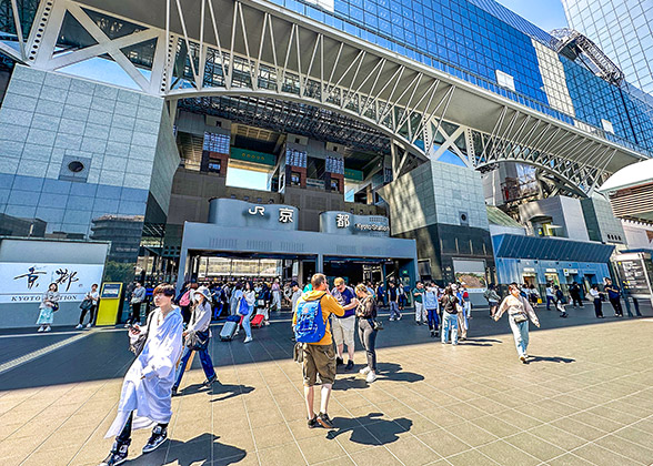 Travellers near the entrance of Kyoto Station