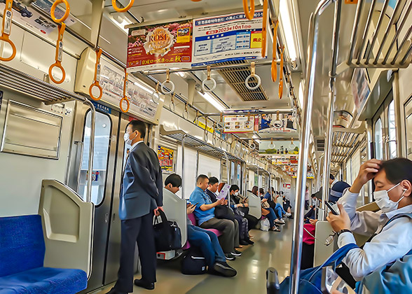Passengers in the carriages of Kyoto Subway