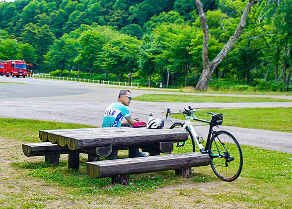People Cycling around Lake Shikotsu