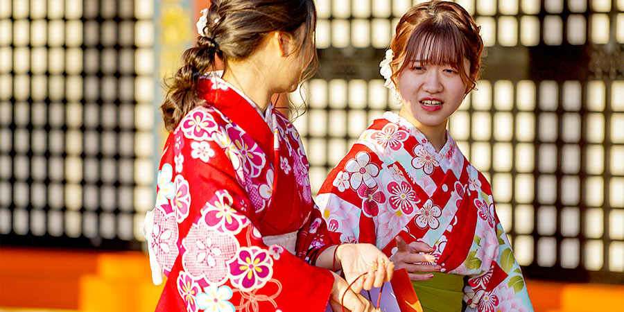 Girls attending coming-of-age ceremony