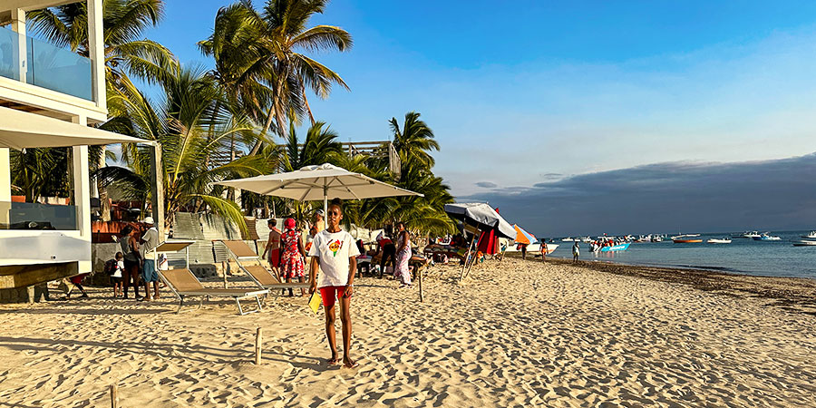 People Enjoying Their Trip on the Beach