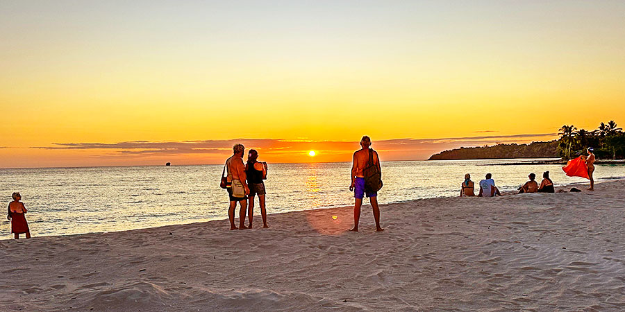 People Watching Sunset in Morombe