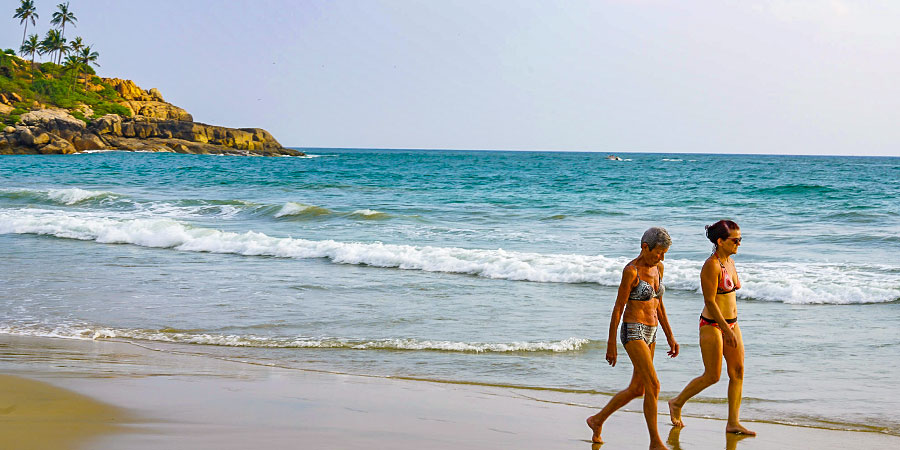 People Strolling on the Beach