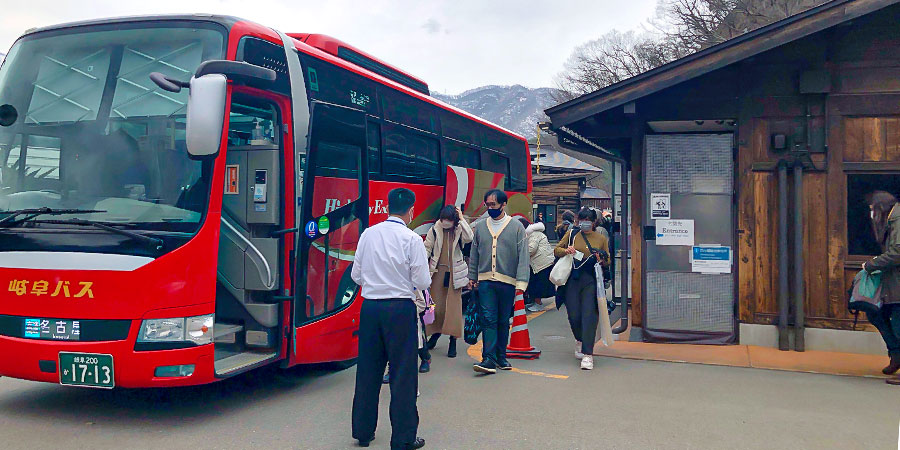 An Osaka Express Bus Driver is Checking Tickets