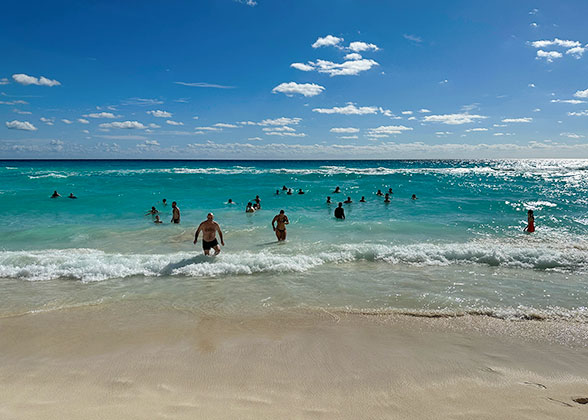 People Relaxing on Emerald Sea