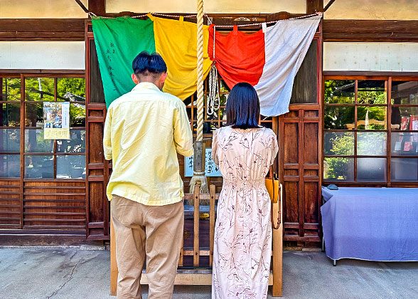 Praying in A Local Shrine