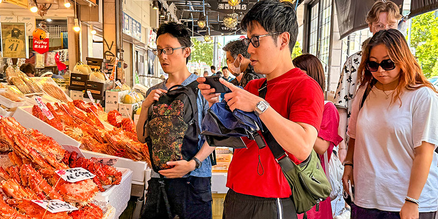 Tourists Selecting Sea Food