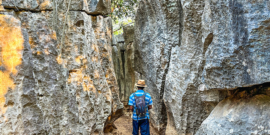 Tourist and Rocks