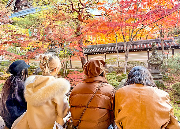 Tourists enjoying the autumn scenery