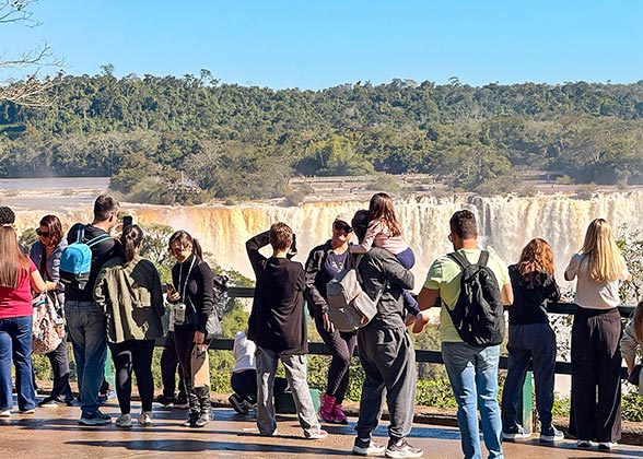 Visitors Snapping Iguazu Falls, Brazil