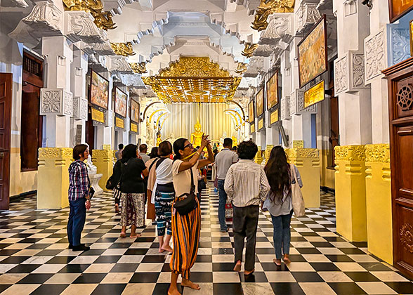 Visitors in Temple of the Tooth, Kandy