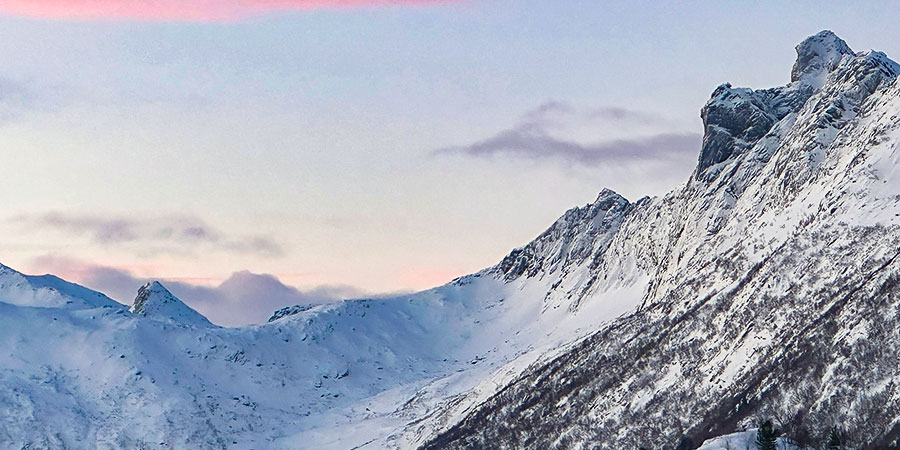 Charming Snow Mountains under Sunshine