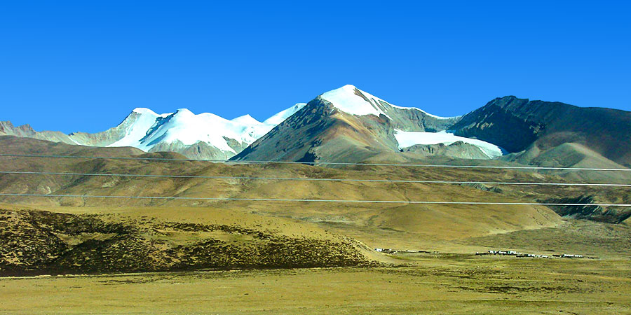 Snow Peaks in Olgii in October