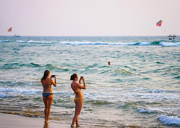 Tourists Capturing Beautiful Seascape on Renaca Beach
