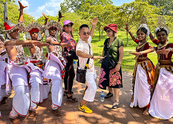 People Wearing Colorful Folk Clothes