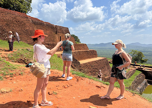 Tourists on Top of Lion Rock