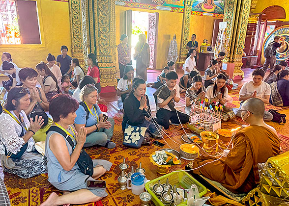 Visitors Praying in the Temple